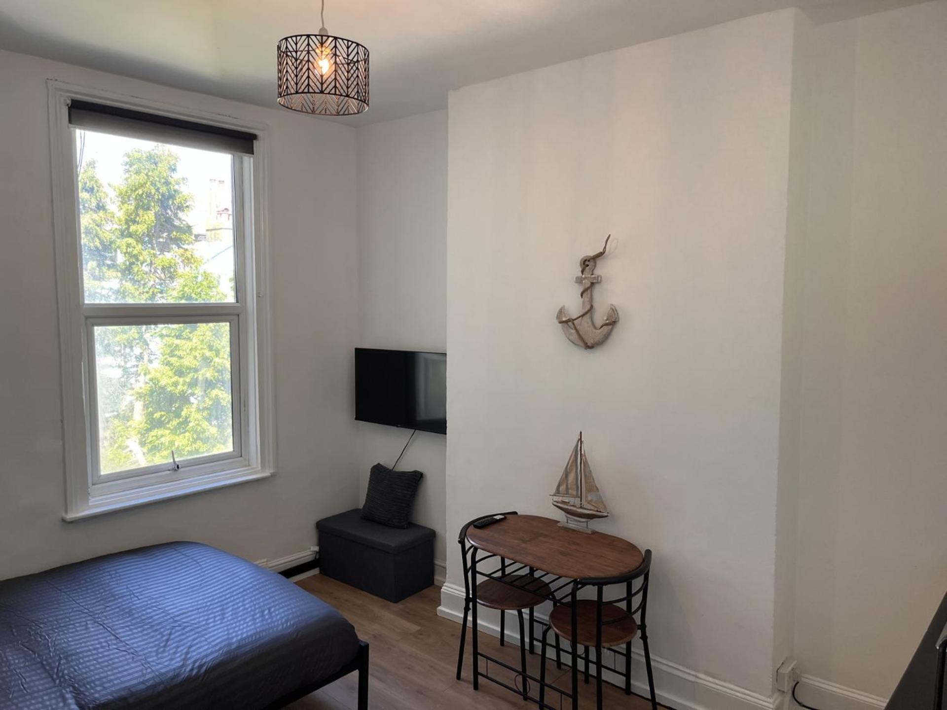 With Kitchenette And Shared Bathroom In The Centre Séjour chez l'habitant *